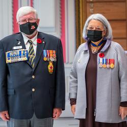 Governor General Mary May Simon and Mr. Bruce Julian are standing beside each other in the Tent Room. Mr. Julian is standing to the right of the Governor General.