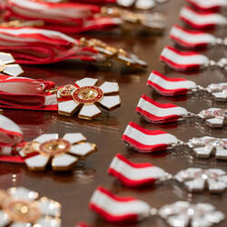 Order of Canada decorations on a table