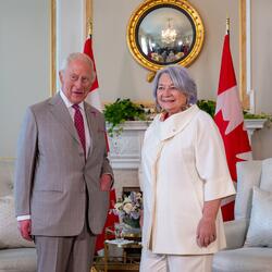 His Majesty King Charles III and Governor General Simon smiling for a photo.