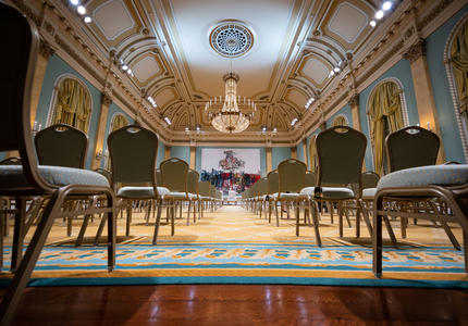 The Ballroom at Rideau Hall. There is no one in the room. The photo is taken at the back of the ballroom facing the front. 