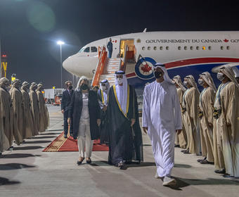 Governor General Mary Simon is welcomed on the tarmac in Dubai.