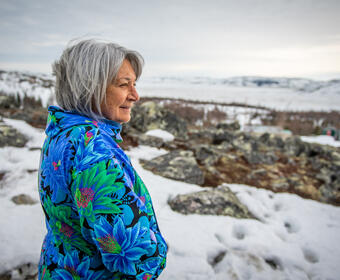 Governor General Mary Simon looking out at nature while in Nunavik.