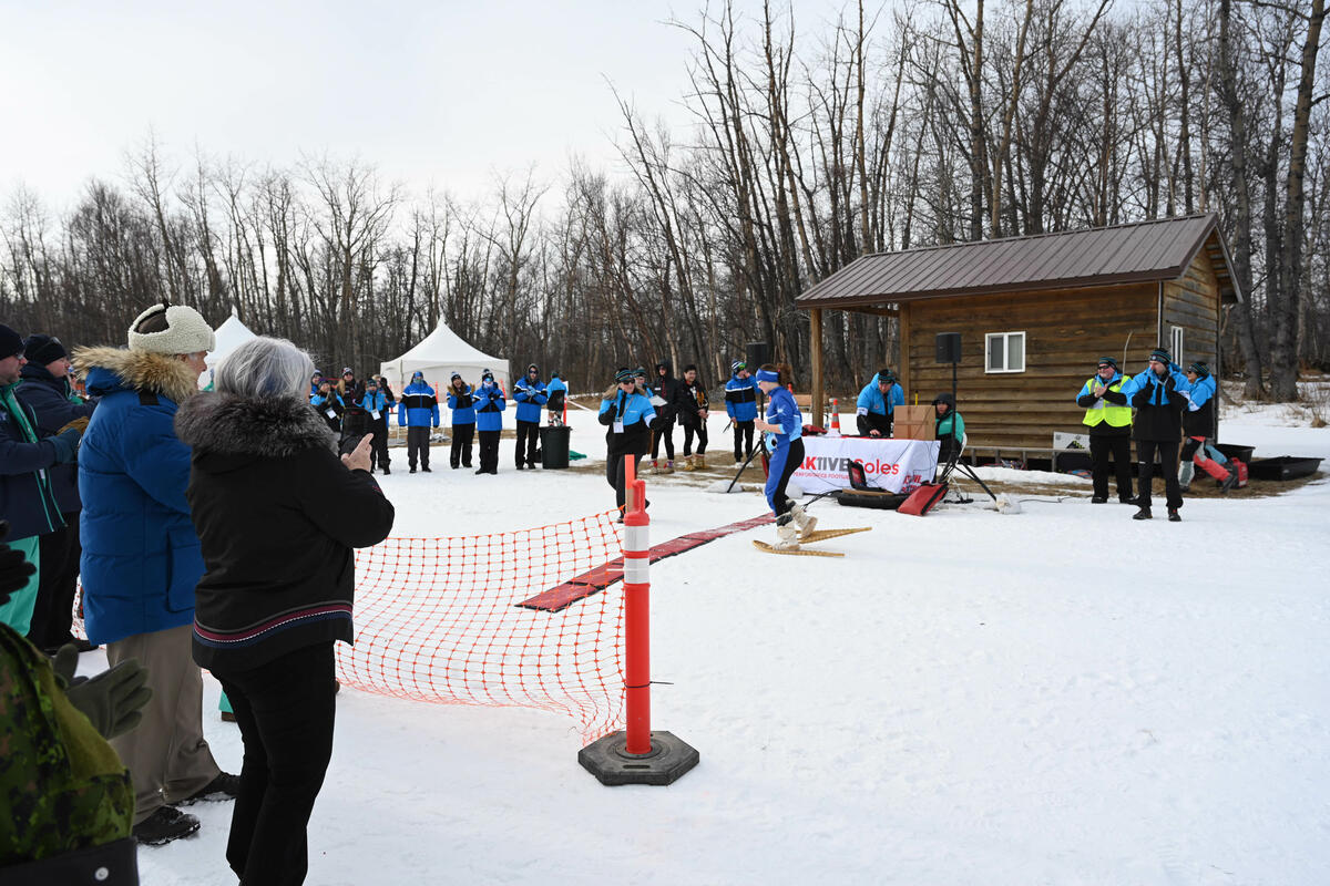 Governor General Mary Simon watches a snowshoe race